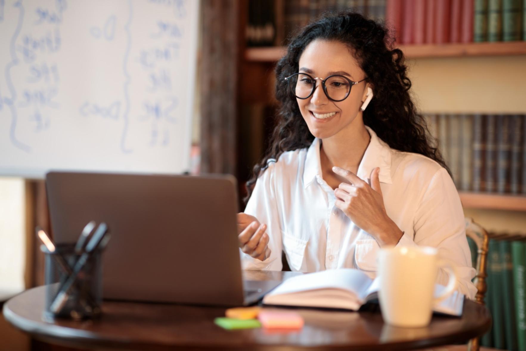 Business professional reviewing financial data and planning documents during a strategic consultation session