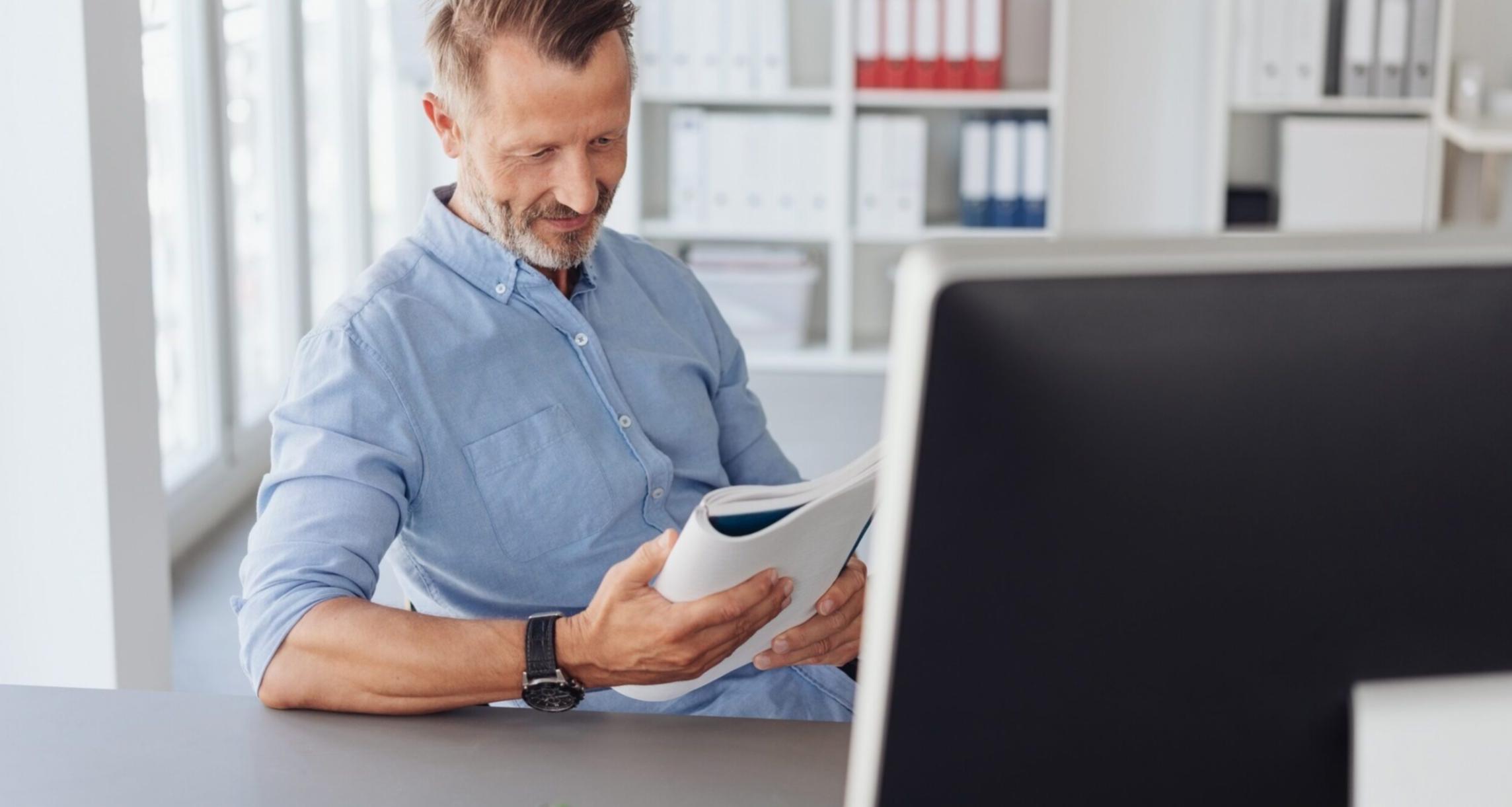 Entrepreneurial financial advisory consultation with business development materials